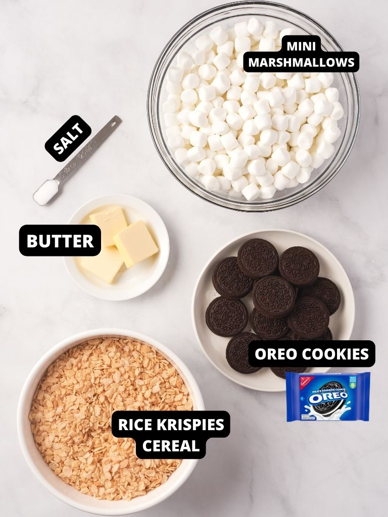 Ingredients needed to make this Rice Krispie recipe with each one labeled in text with what it is. 