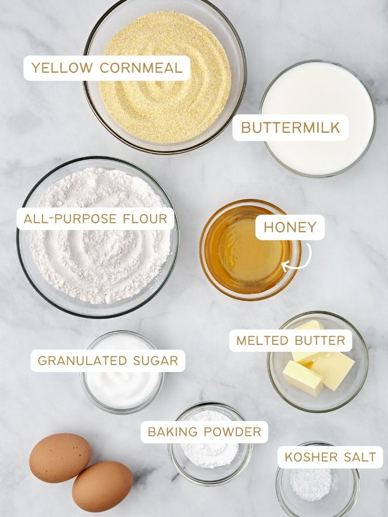 Ingredients on a white background with each one labeled with what it is. 