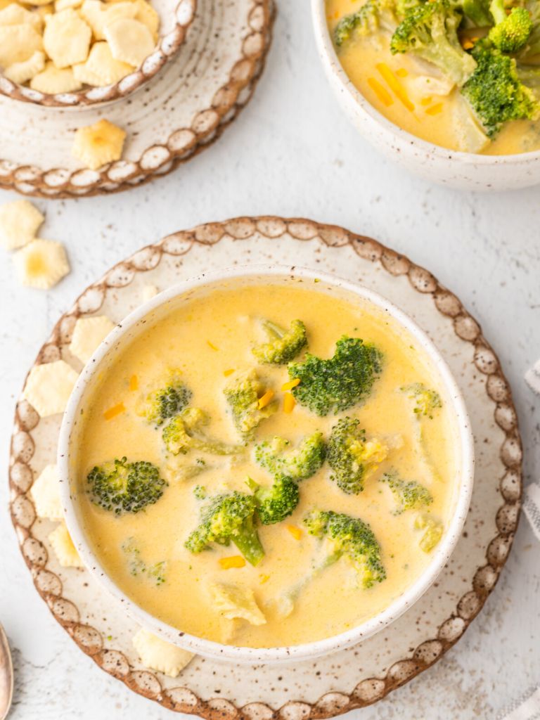 Broccoli Cheddar Soup Recipe hero photo of a bowl of soup. 