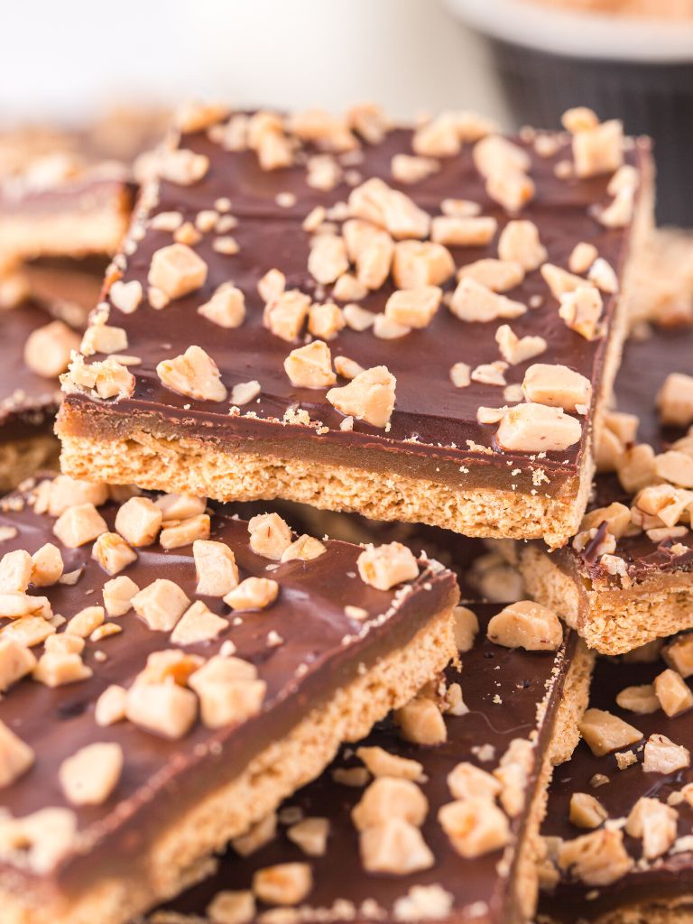 Pile of toffee with crackers. 