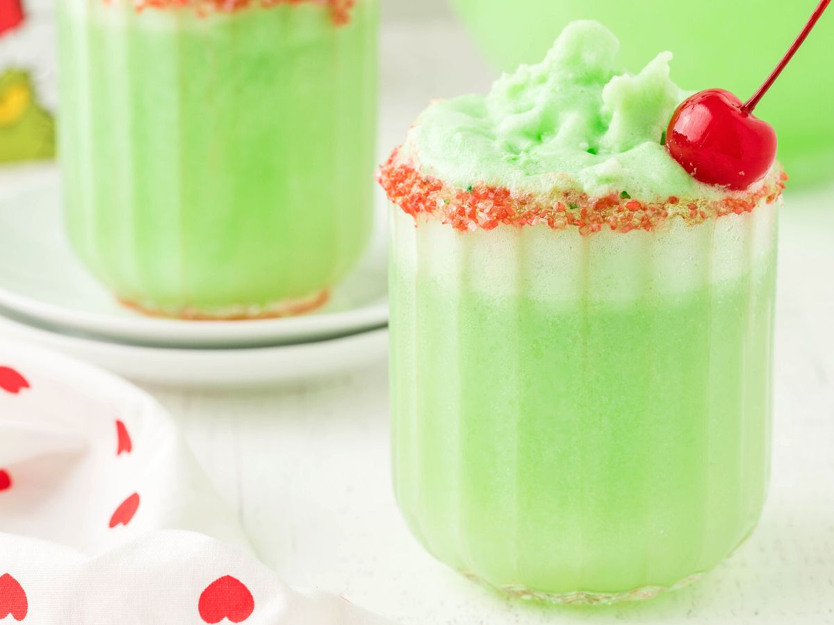 Horizontal image of grinch punch inside a glass cup. 