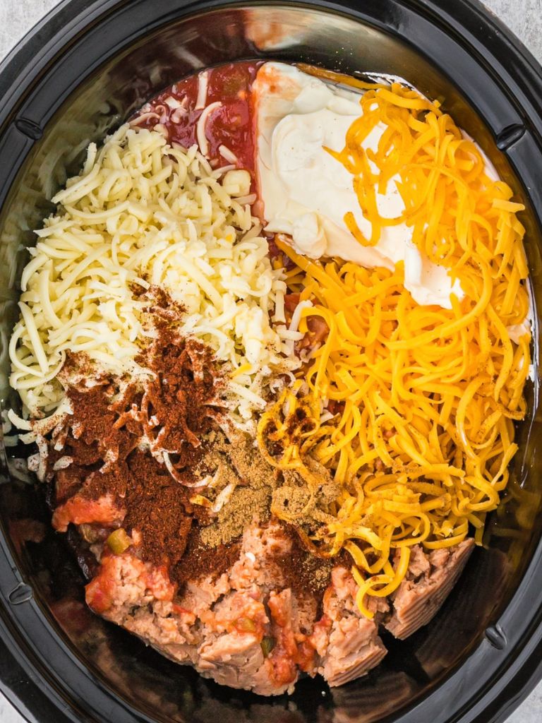 Ingredients inside a crock pot showing what it takes to make this recipe. 