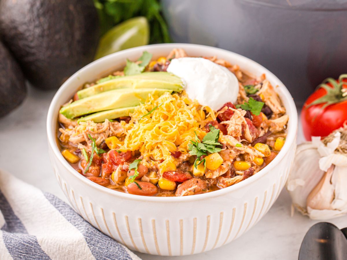 Process photos showing how to make this recipe for taco soup with chicken in it. 