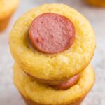 Stack of two of these mini muffins with a hot dog in them.