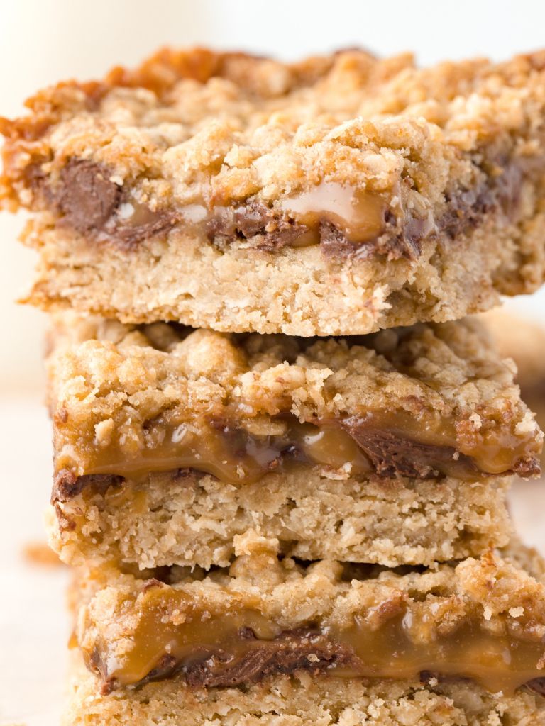 A stack of bars with caramel and chocolate.