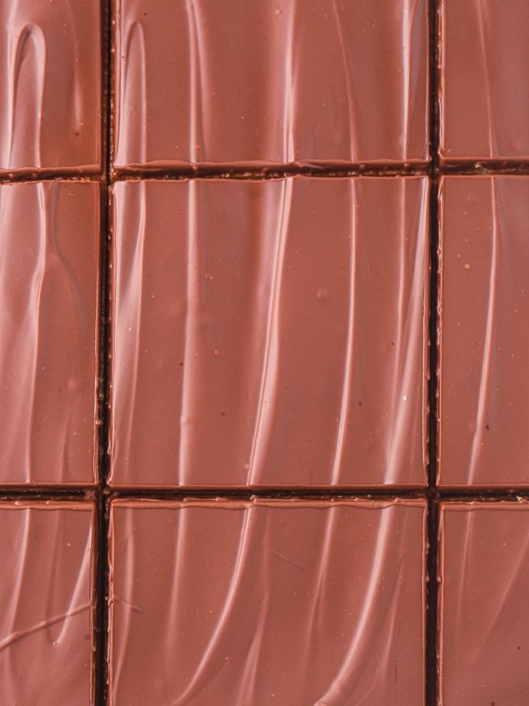 Overhead shot of sliced bars with the chocolate topping showing.