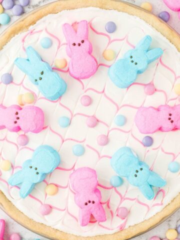 Overhead photo of a cookie pizza with peeps on it.