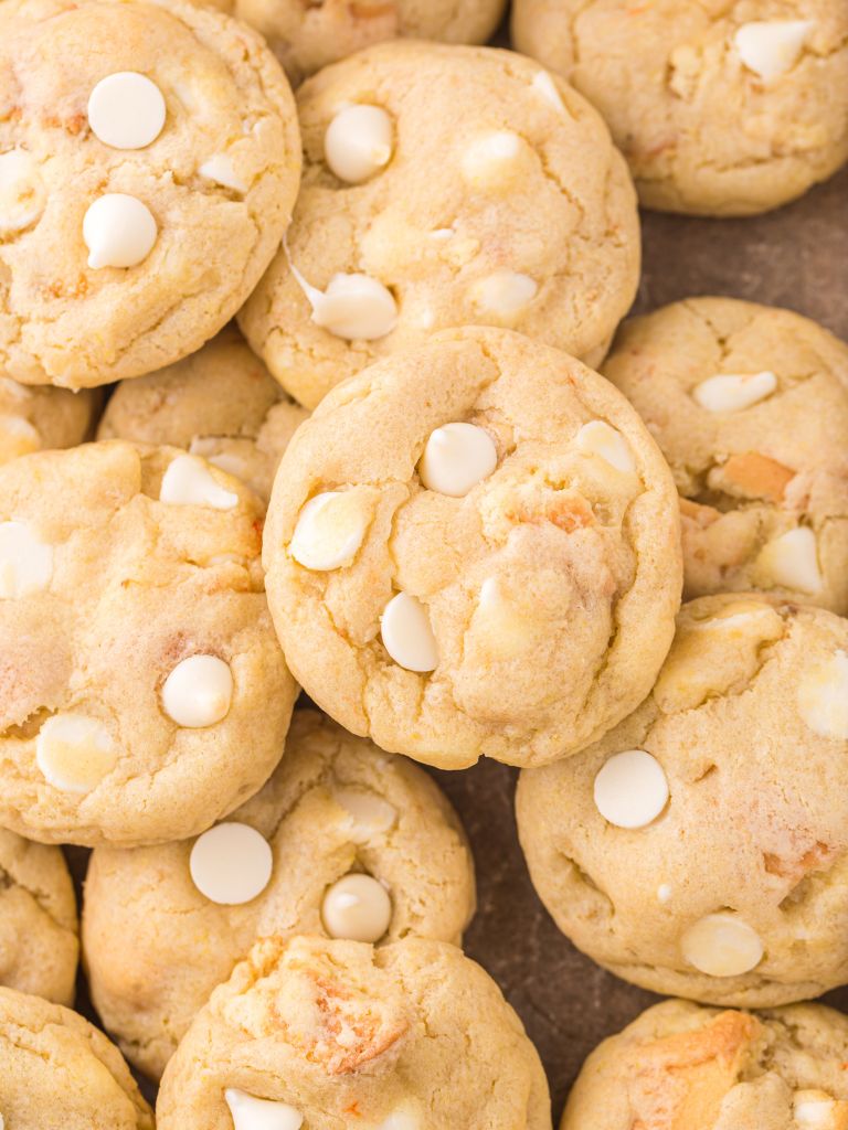 Overhead shot of cookies with white chocolate chips and Nilla wafers peeking through.