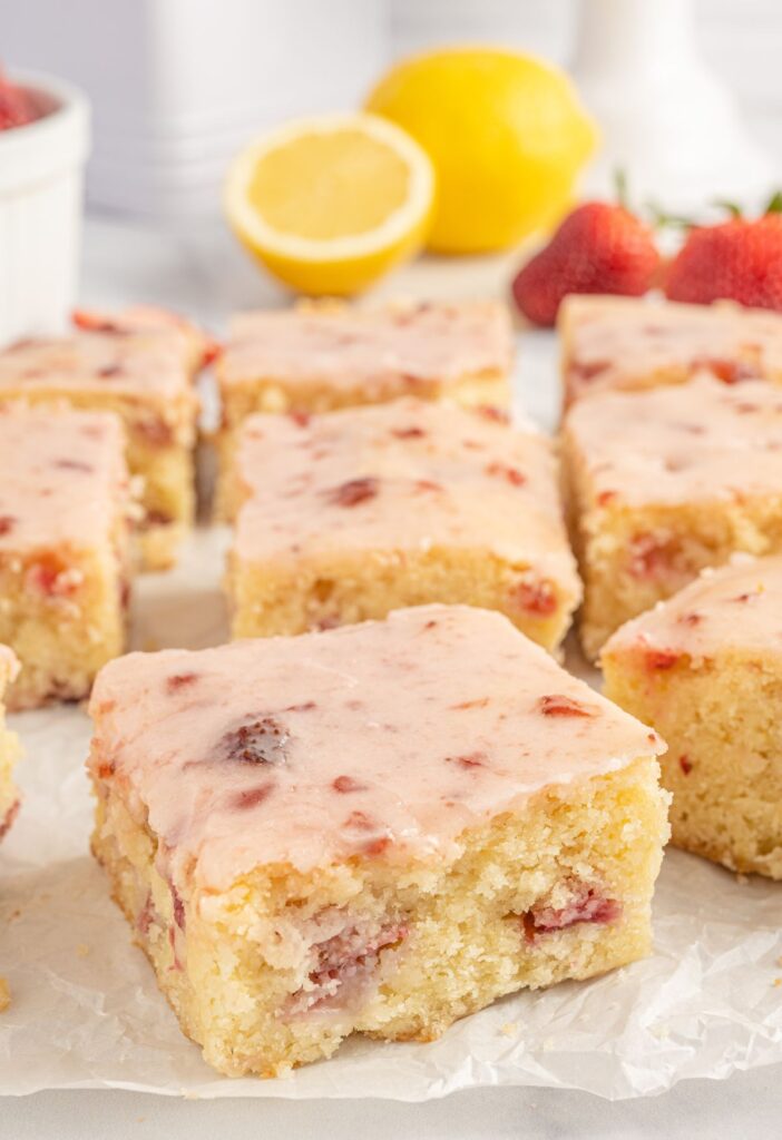 A bar up close showing the strawberry glaze and lemon in the background. 