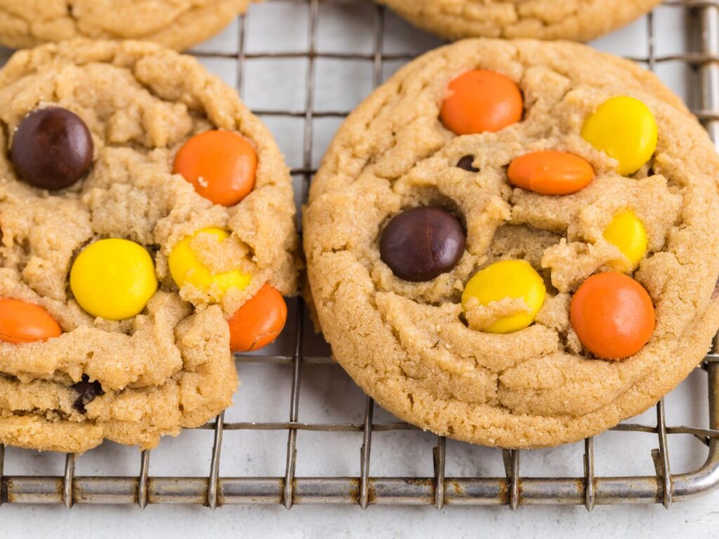 Process photos for how to make this peanut butter cookie recipe with Reeses pieces candies.