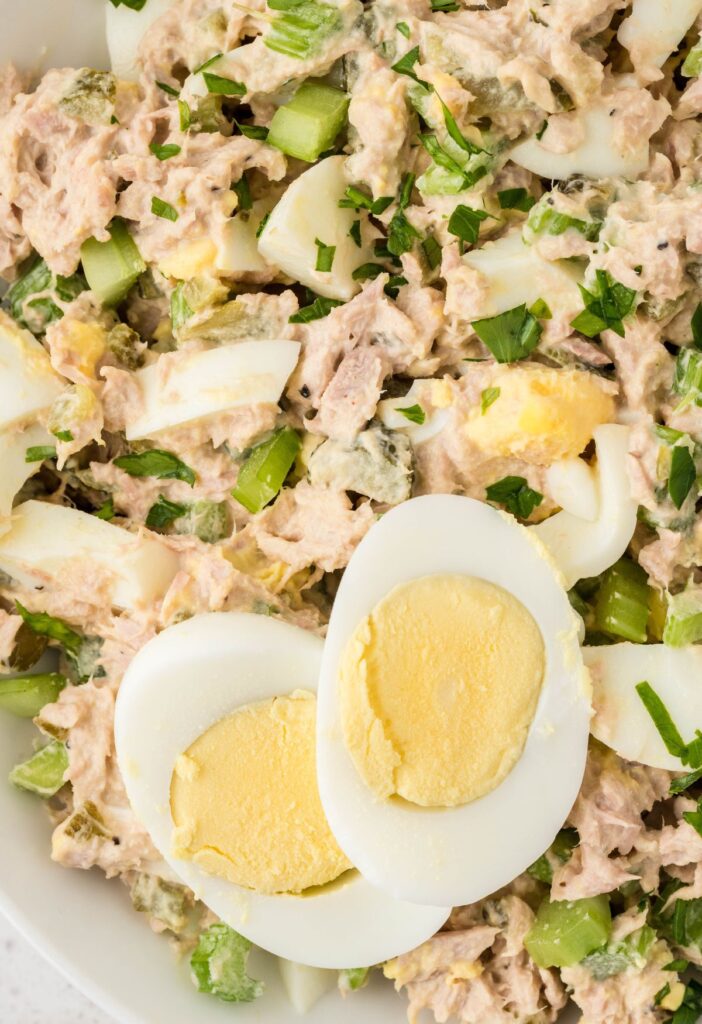 Close up of this salad with hard boiled eggs as garnish. 