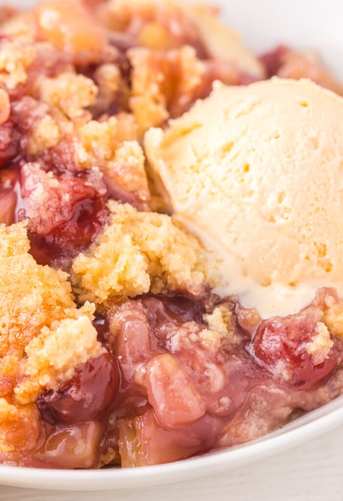 A bowl of this dump cake with ice cream on top. 