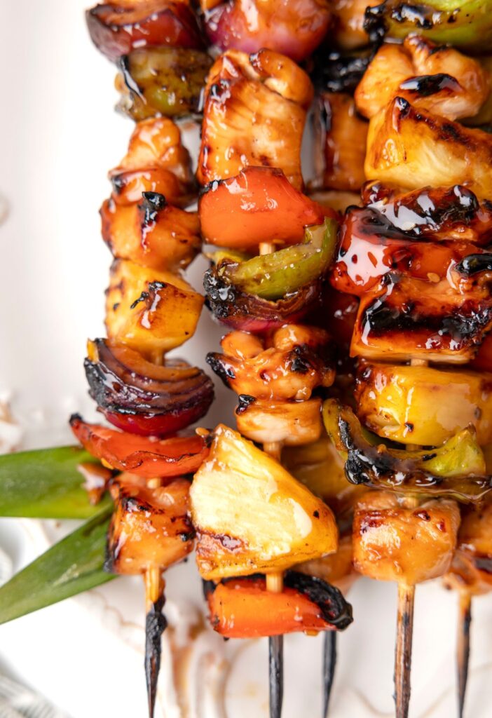 Close up of the cooked kabobs with a glaze over top. 