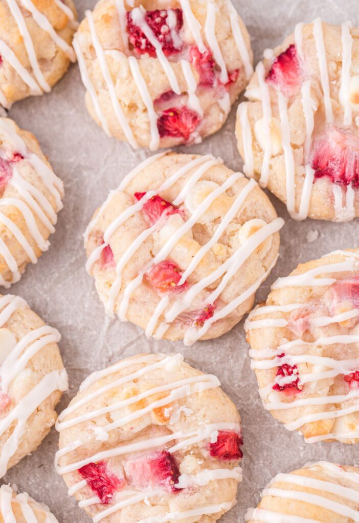 Glazed cookies on parchment paper