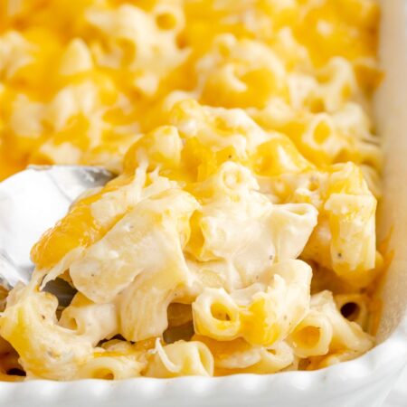 A scoop of this Mac and cheese inside the baking dish.