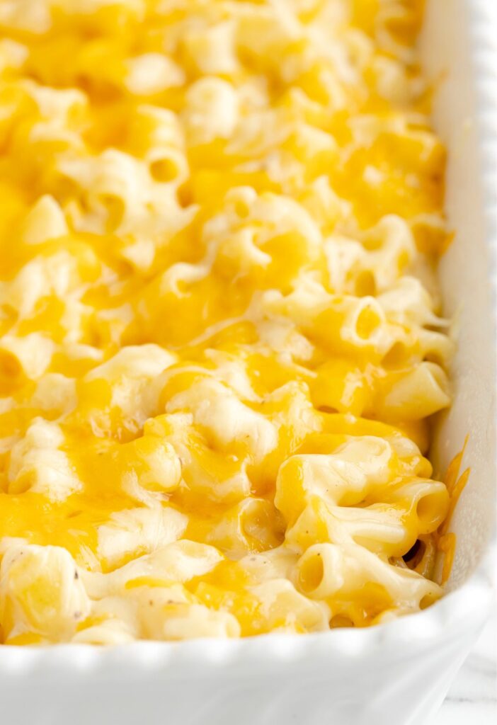 Cheesy Mac and cheese inside the casserole baking dish. 