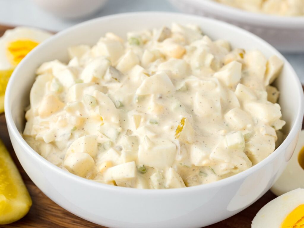 Process images showing how to make this dill pickle egg salad with step by step instructions.