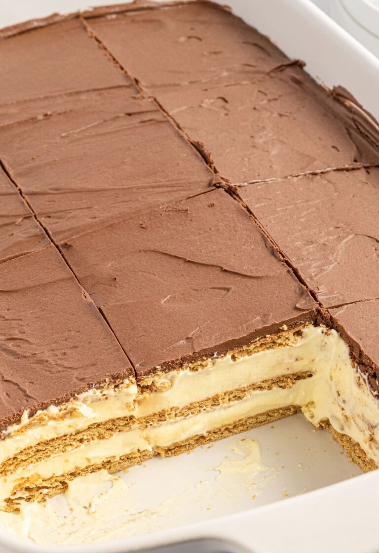 A pan of icebox cake showing a side view of the layers.