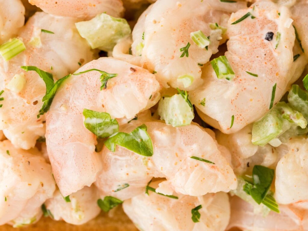 Step by step process photos showing how to make this shrimp roll recipe.