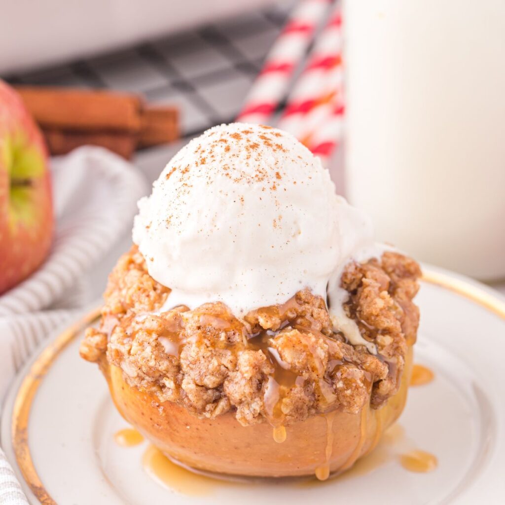 An apple with topping and ice cream. 