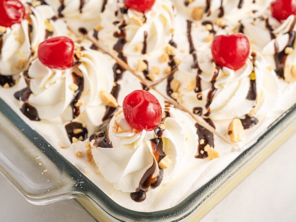 Step by step process photos showing how to make this banana split dessert.