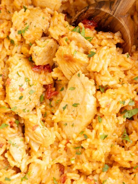 Close up of the pot of chicken and rice with queso sauce.