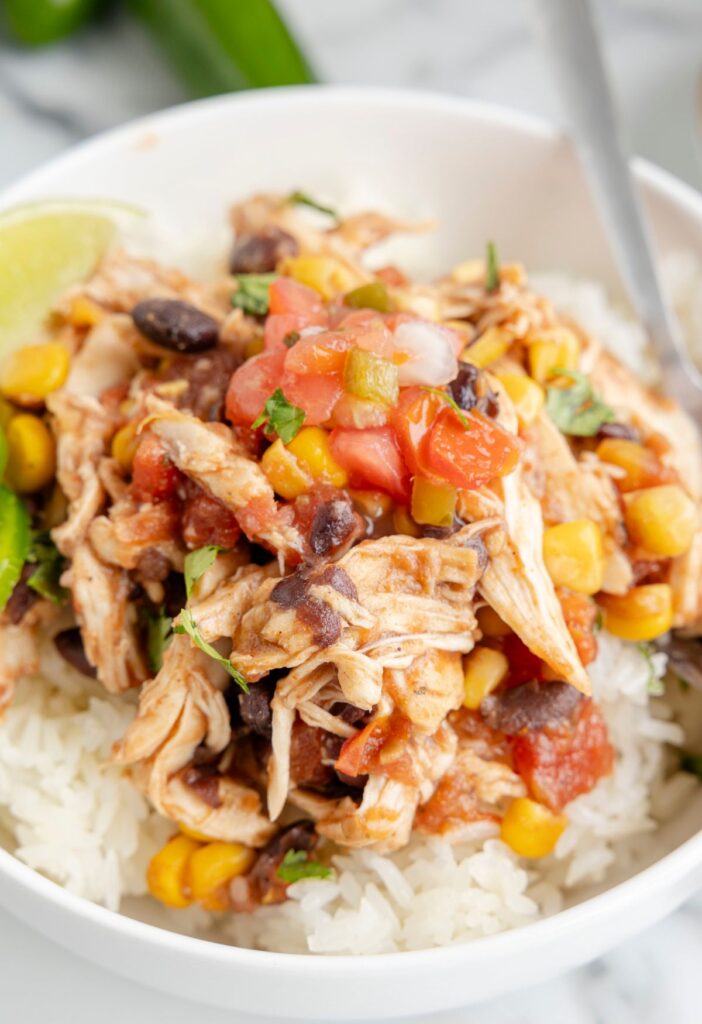 Burrito bowl with chicken on rice.