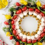 Appetizer skewers arranged in a circular pattern for a wreath.