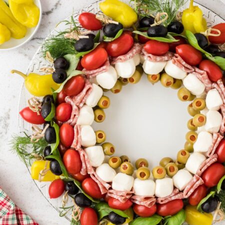 Appetizer skewers arranged in a circular pattern for a wreath.