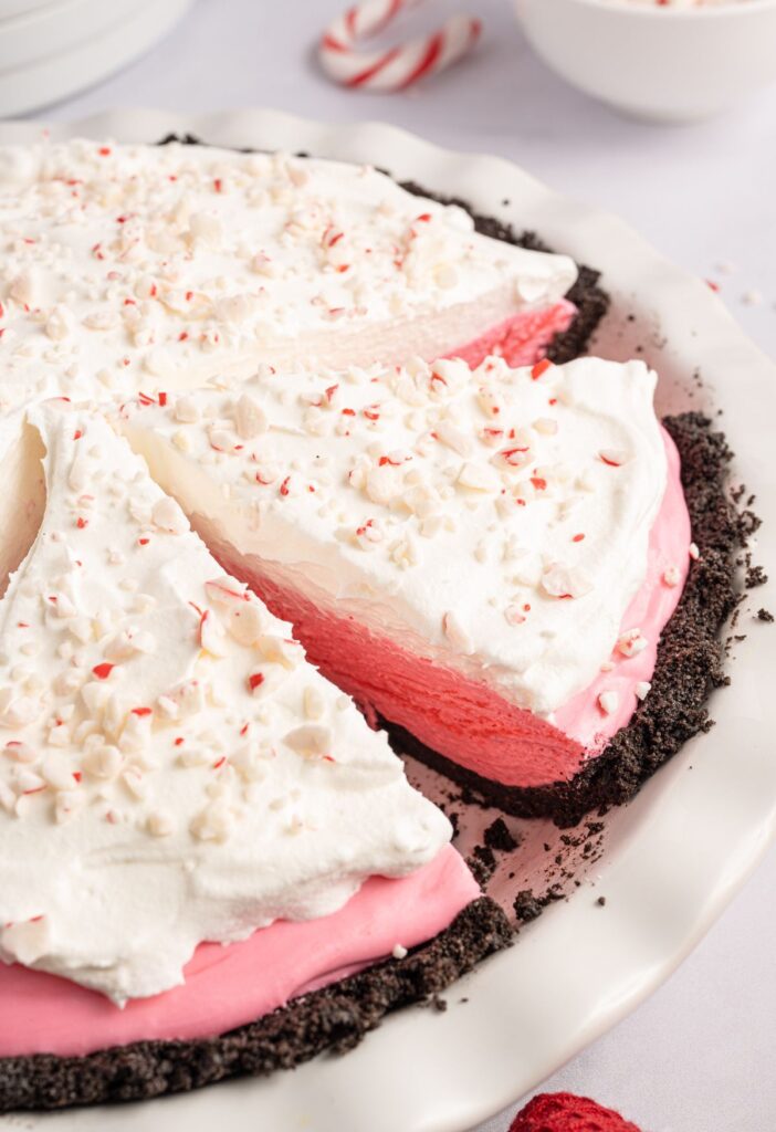 A pie plate with slices of the peppermint pie in it. 