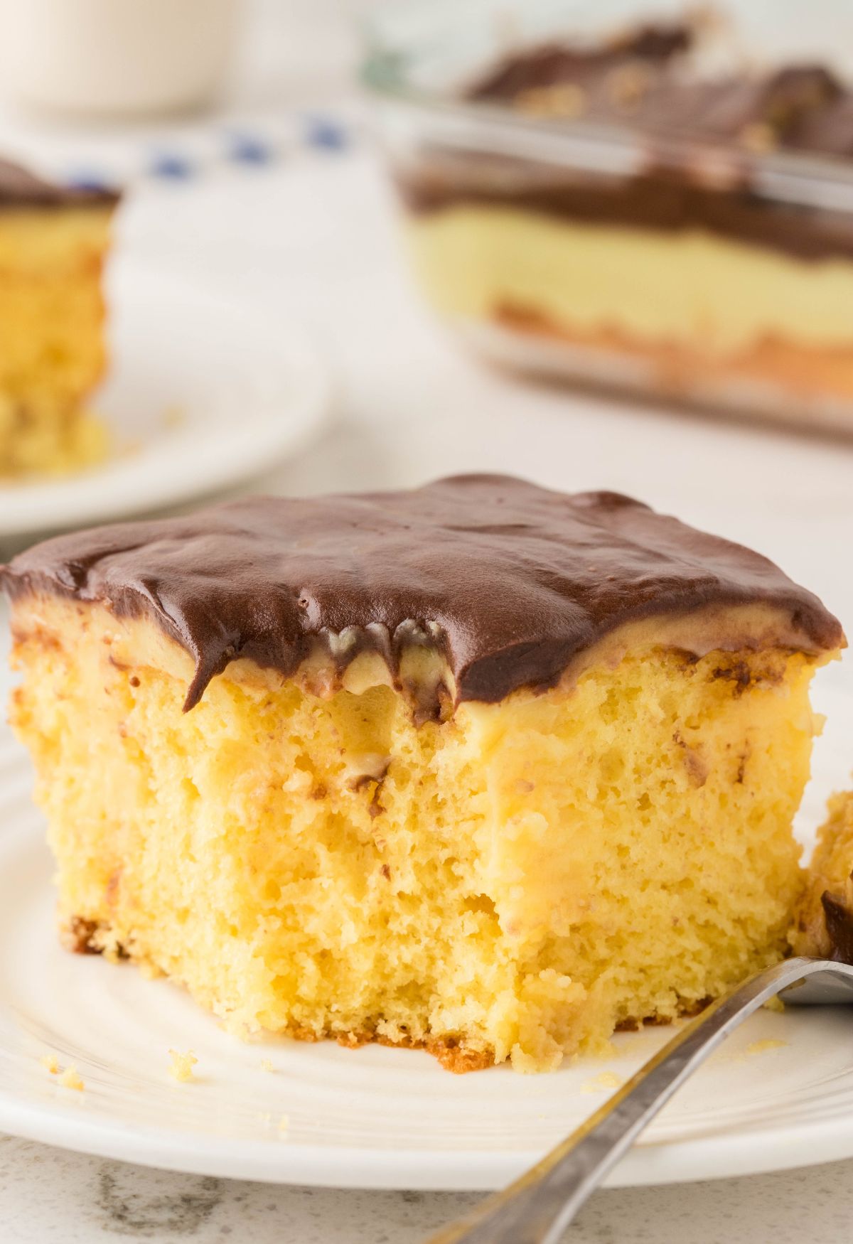 Easy Boston Cream Poke Cake Recipe - Together as Family