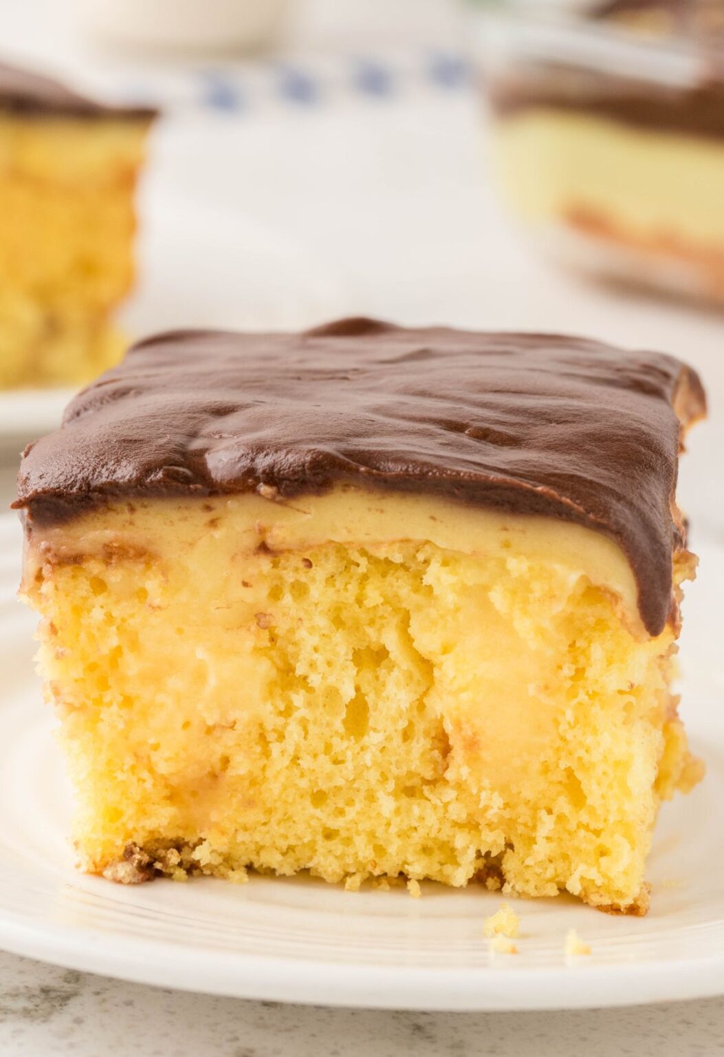 Easy Boston Cream Poke Cake Recipe - Together as Family