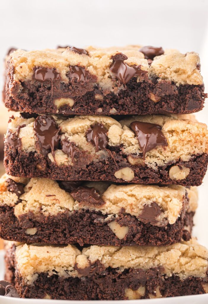 Stack of cookie bars with brownies and chocolate chip cookies. 