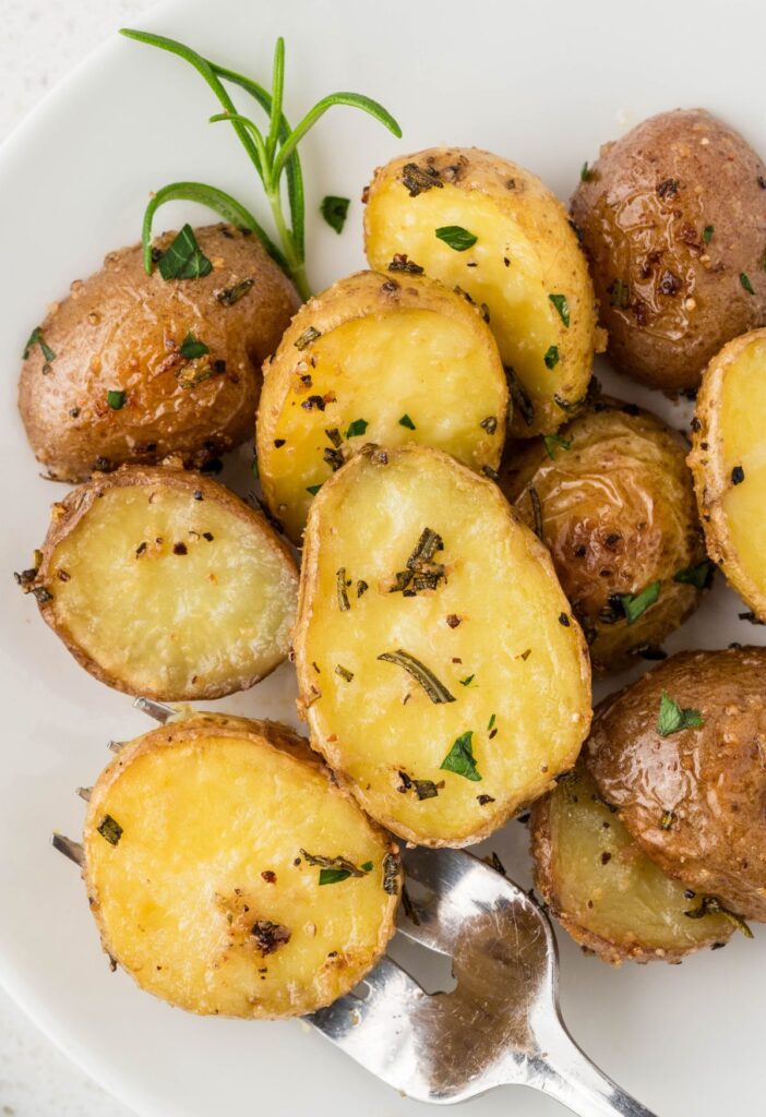 A fork inside a potato
