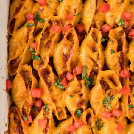 A pan of stuffed shells that have been baked