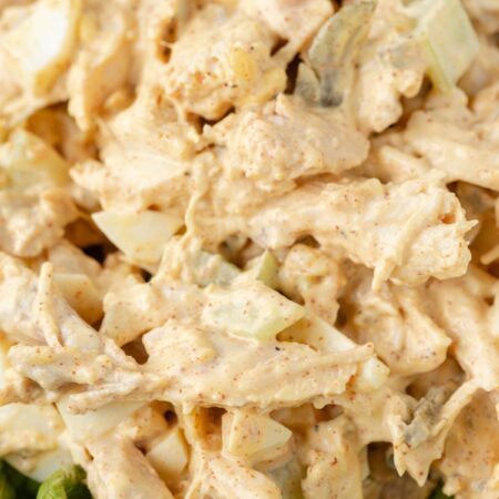 Creamy chicken salad on a bed of green lettuce