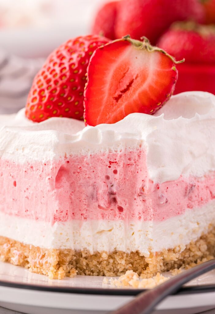 Layered lush dessert with strawberries 