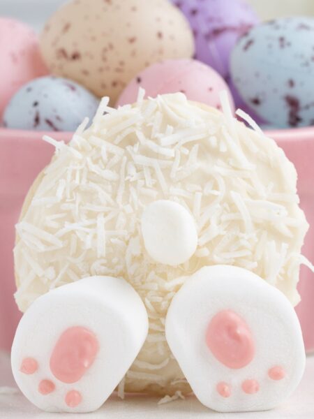 A bunny butt cookie with coconut and marshmallows on it.