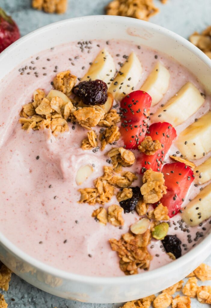 A bowl of smoothie with toppings.