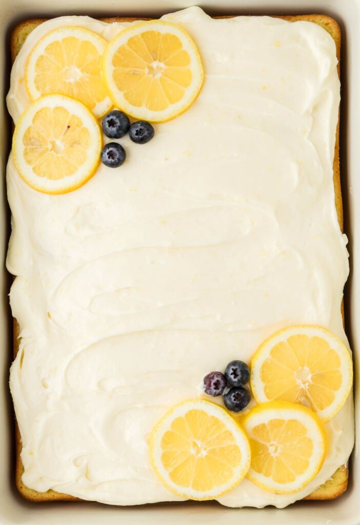 Overhead pic of the cake with blueberries and lemon. 