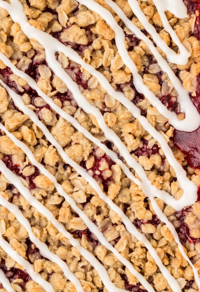 Close up of the top of the dessert bars with crumble oat topping. 