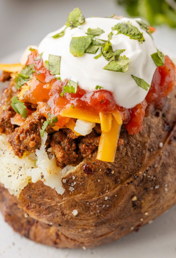 Hero image of the potato with taco toppings. 