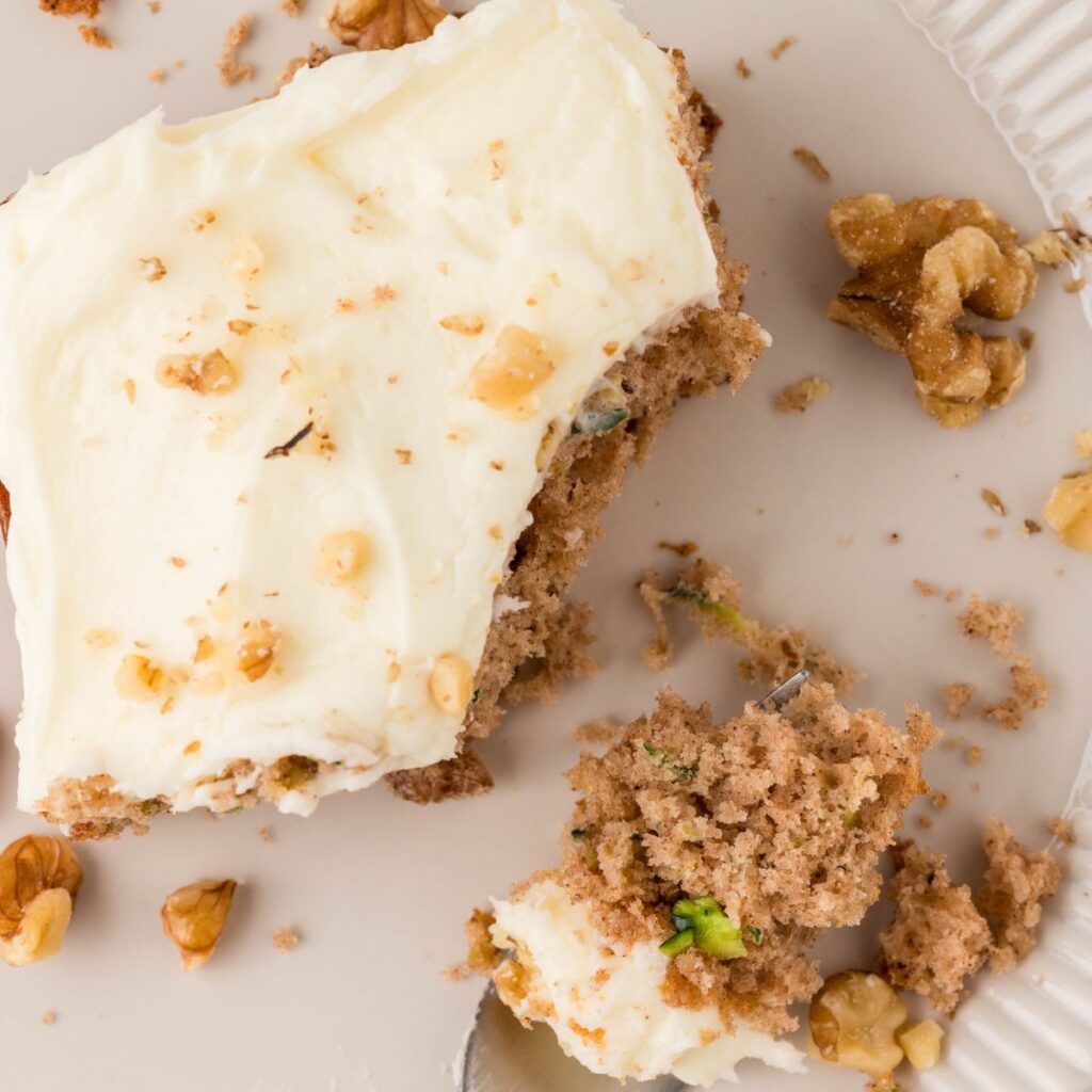 A slice of the cake on a plate with a fork