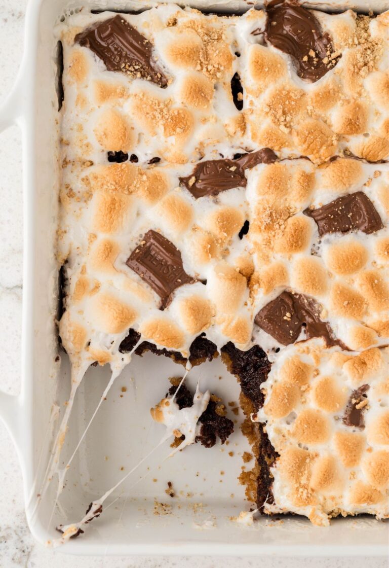 A pan of brownies with s'mores toppings.