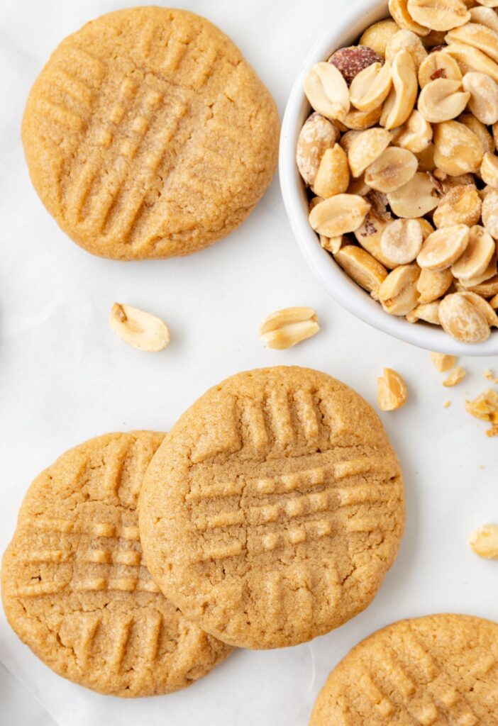 Cookies with a bowl of peanuts