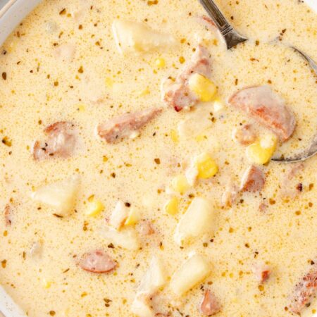 A bowl of the chowder with kielbasa and corn.