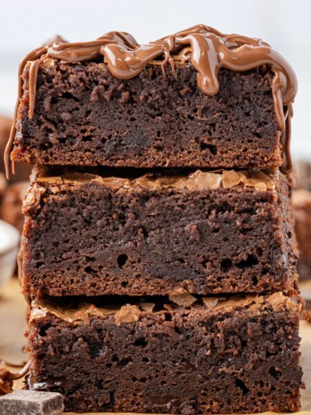 A stack of brownies with Nutella on top