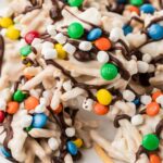 Pile of elf cookies on a white plate