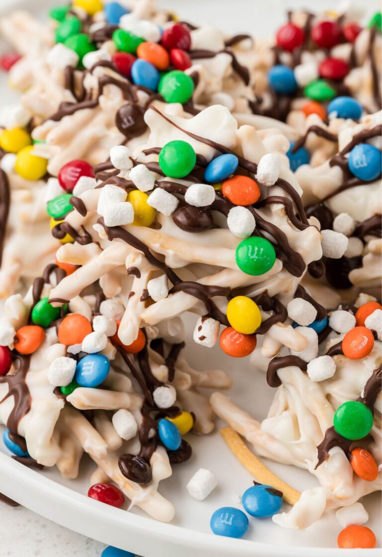 Pile of elf cookies on a white plate