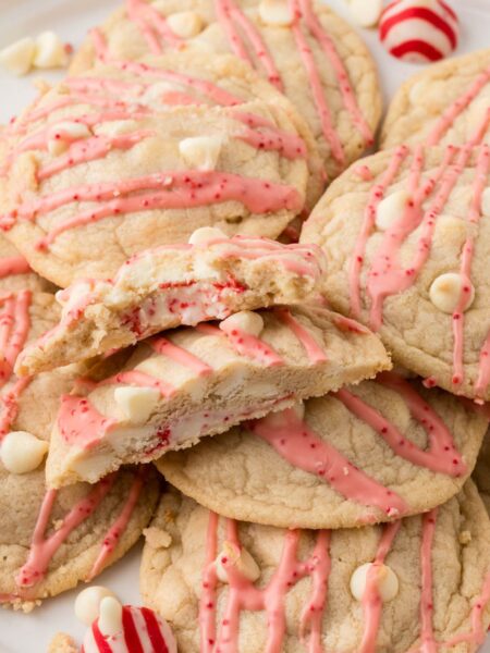 Pile of cookies with one cut in half.